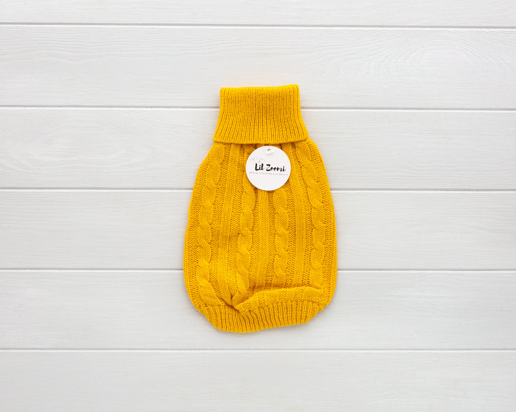 cat and dog yellow cable knit sweater front
